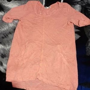 Small pink tshirt with pockets see through.